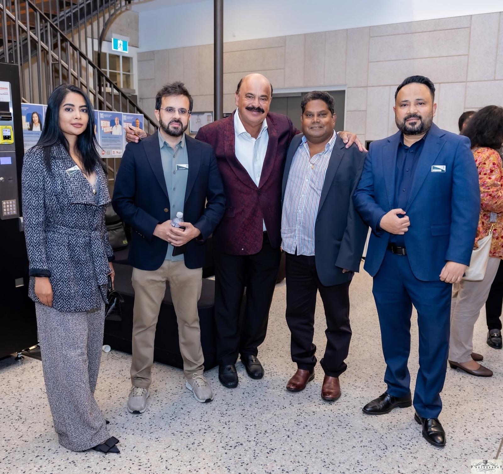A group of members together at the Artha Business Roundtable.